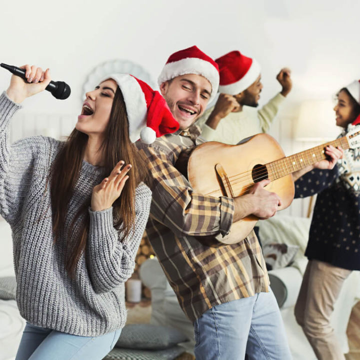 Friends Playing Christmas Song Games