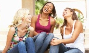 women laughing at funny mad libs game
