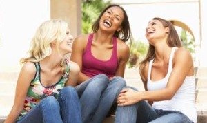 women laughing at funny mad libs game