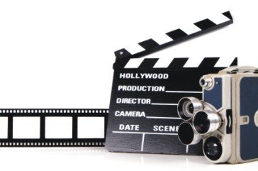 movie camera, clapboard and film